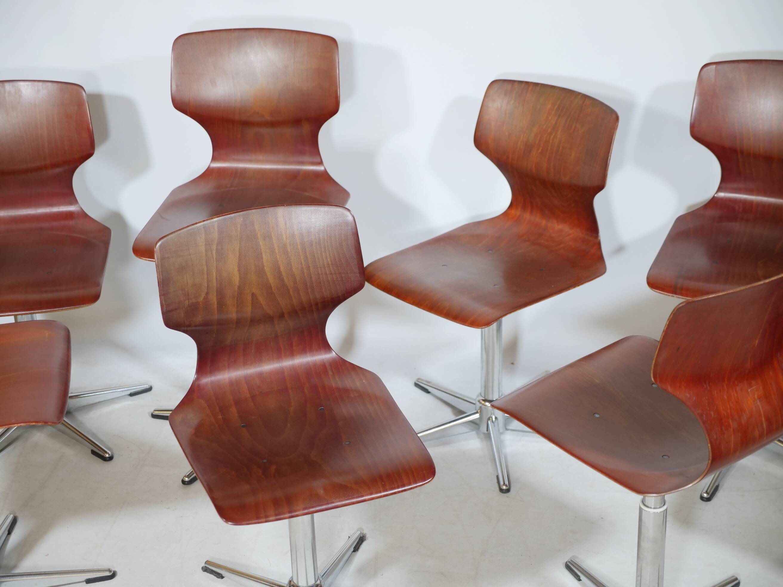 8 chaises pivotantes Flototto, années 70