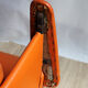 Barber in leatherette Chair orange 1970s