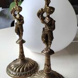Pair of anthropomorphic candlesticks/Servants of the king holding the flame. In gilded bronze