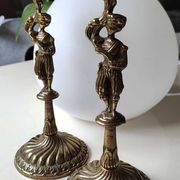 Pair of anthropomorphic candlesticks/Servants of the king holding the flame. In gilded bronze