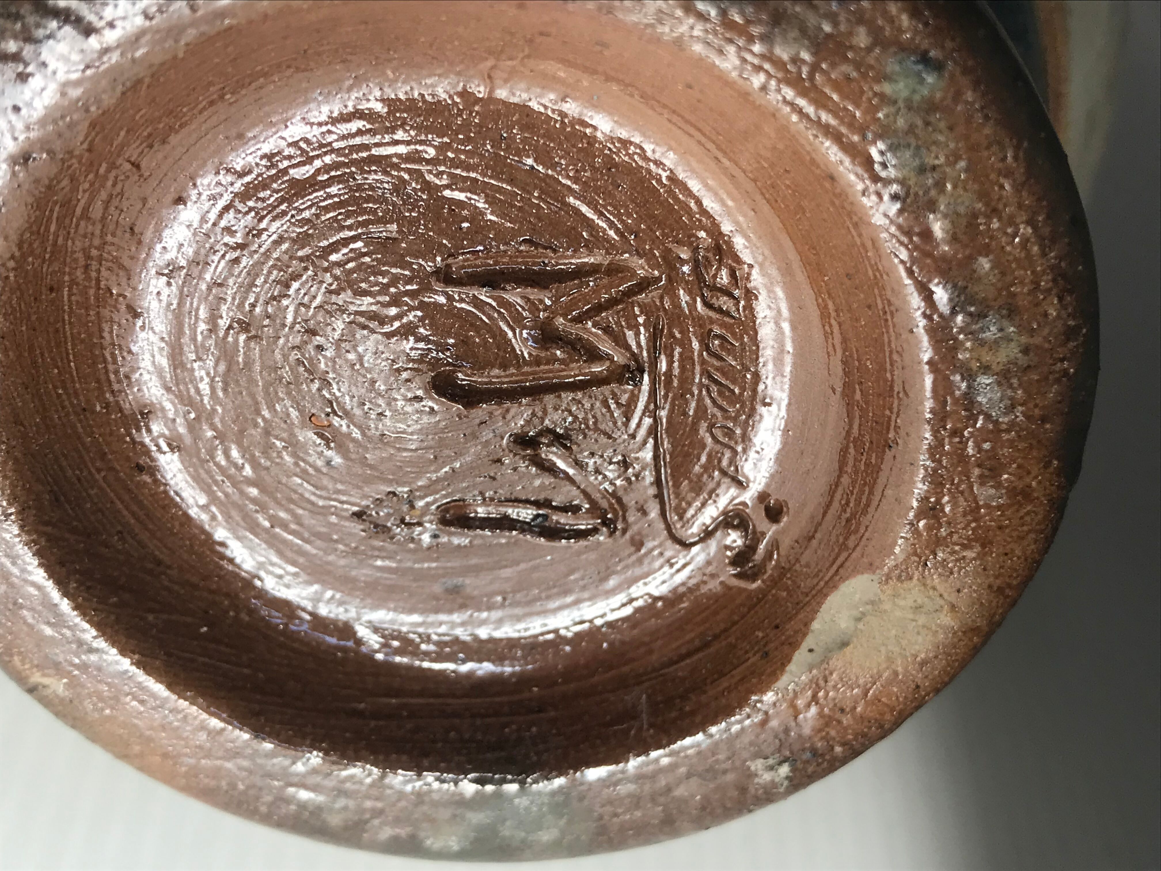 Sandstone vase signed Guérin