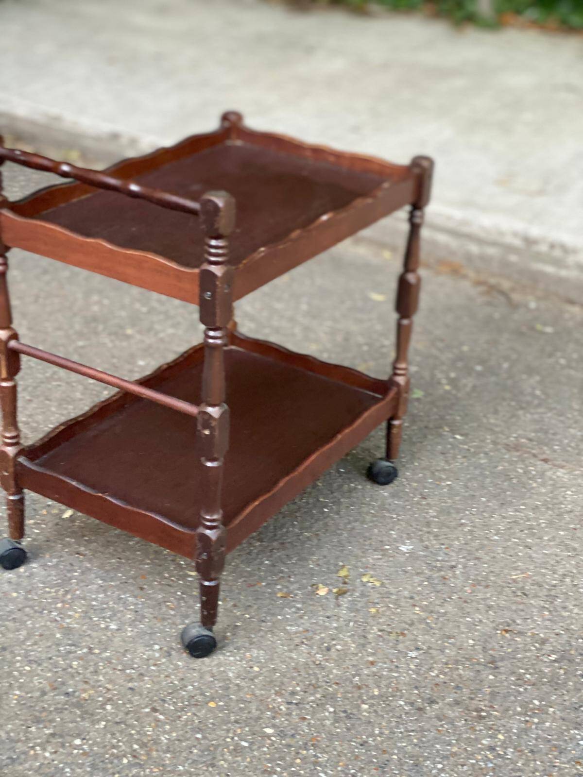 Solid wood serving trolley on wheels