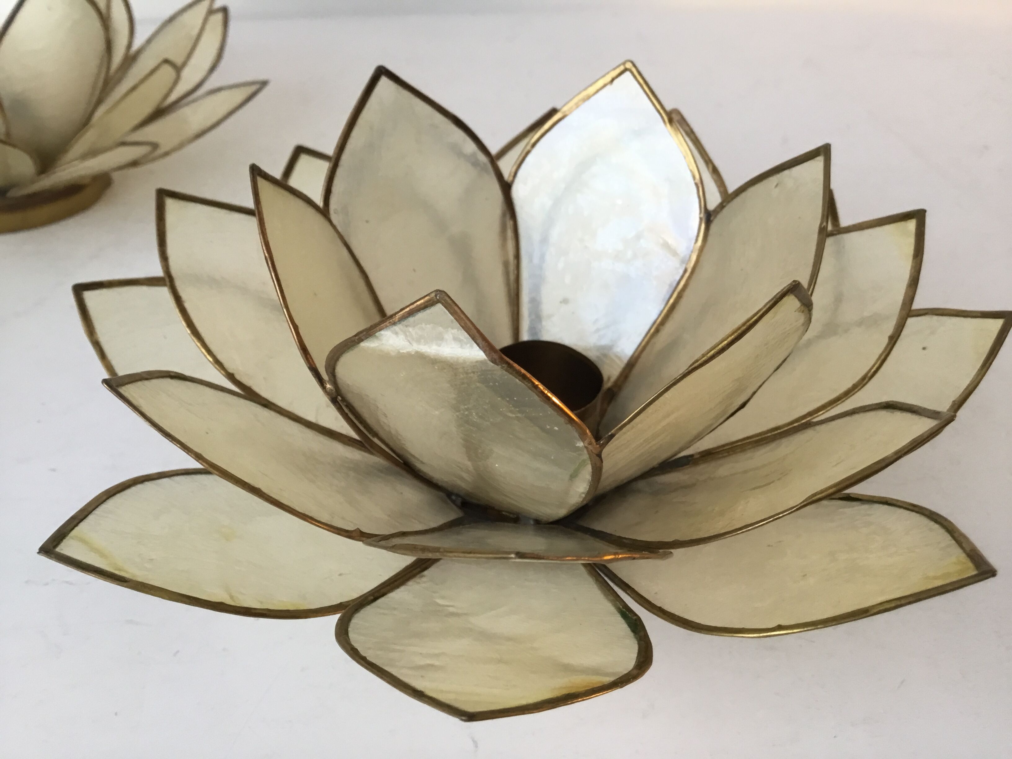Pair of candlesticks in mother of Pearl and brass