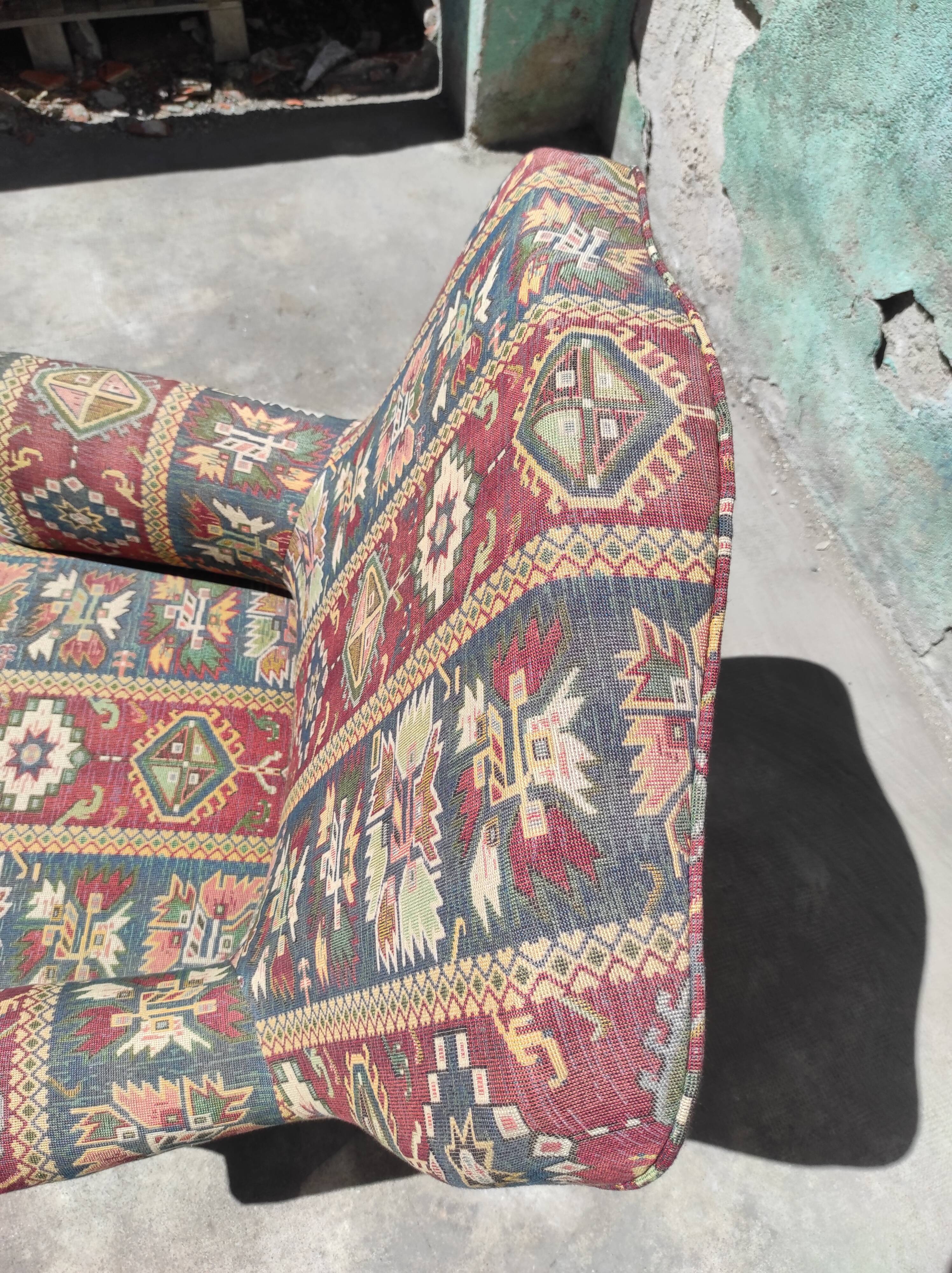 Old meridian armchair with armrests