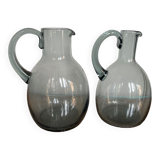 Set of two Daum pitchers in smoked crystal