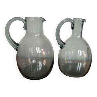 Set of two Daum pitchers in smoked crystal