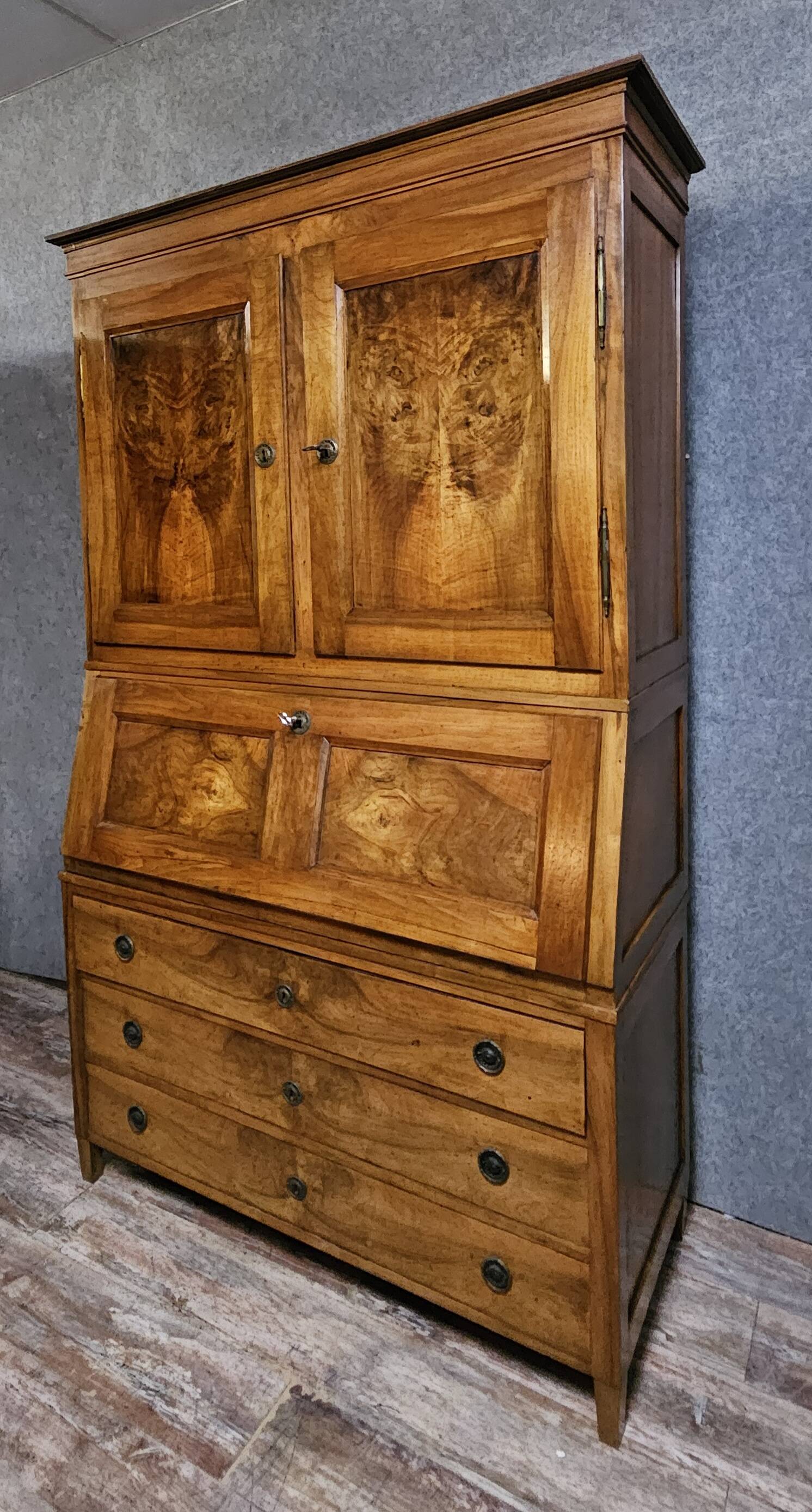 Secretary with three bodies in walnut from the Louis XVI period.