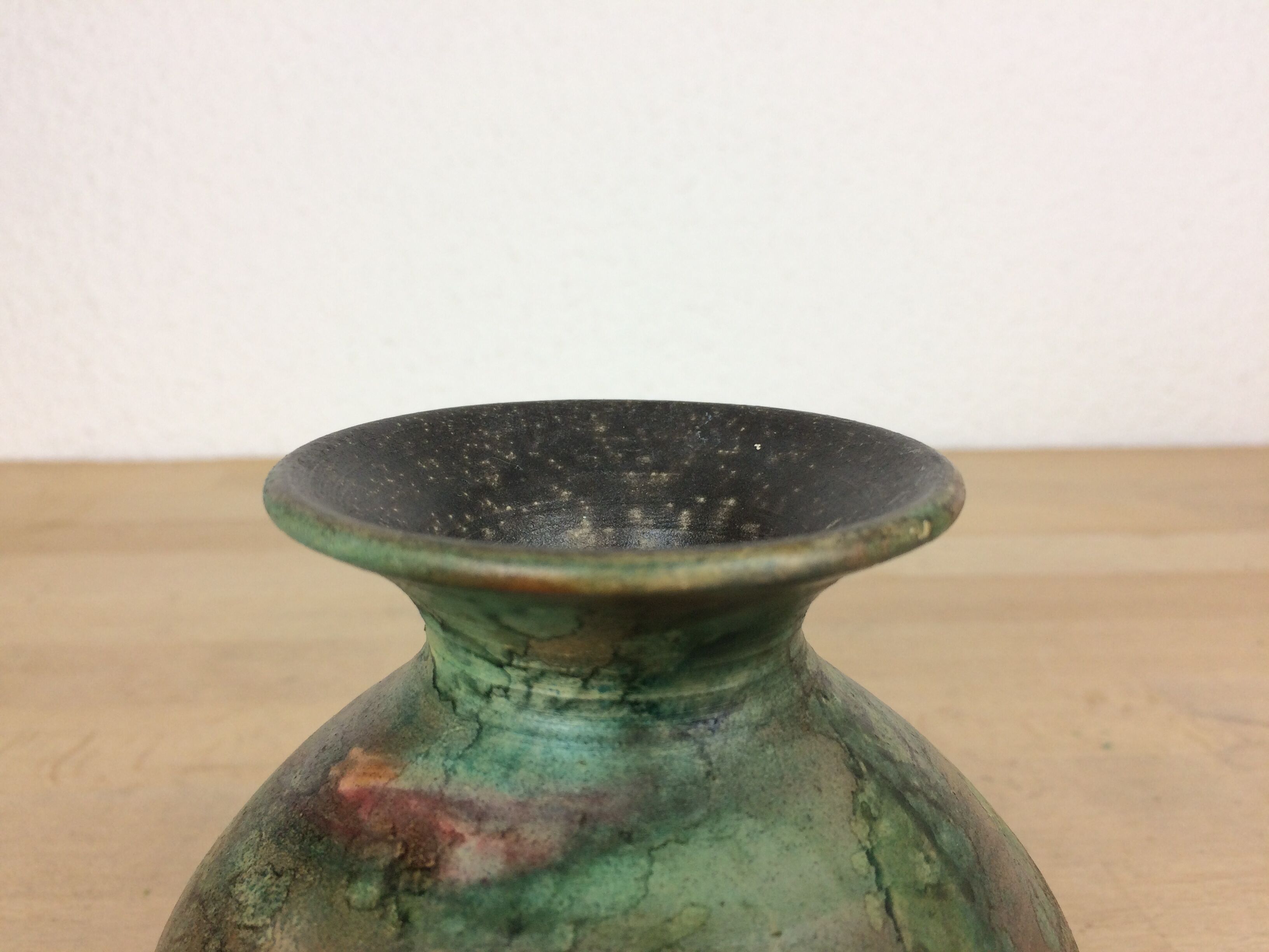 Vintage green ceramic ball vase
