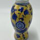 Yellow Chinese vase with blue patterns, 19th century