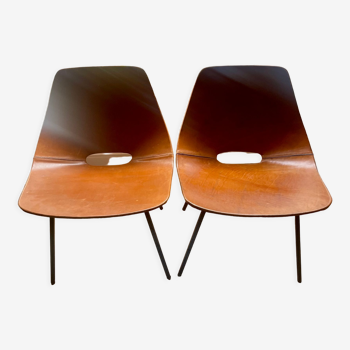 2 Pierre Guariche leather tonneau chairs