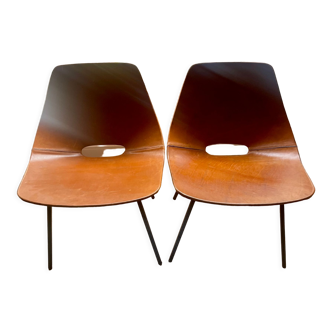 2 Pierre Guariche leather tonneau chairs