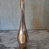 Brass heron