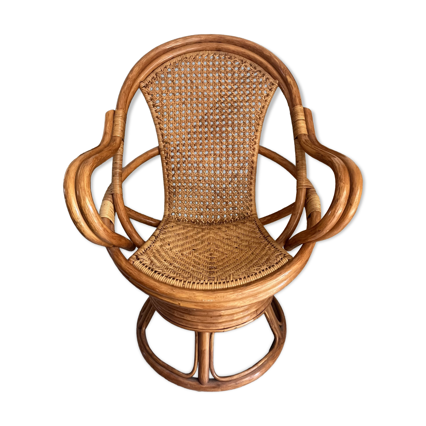 Vintage rattan and cane swivel armchair (1970s/80s) -