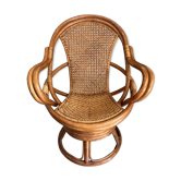 Vintage rattan and cane swivel armchair (1970s/80s) -