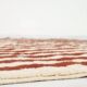 A handmade Moroccan striped terracotta rug, 150/250cm