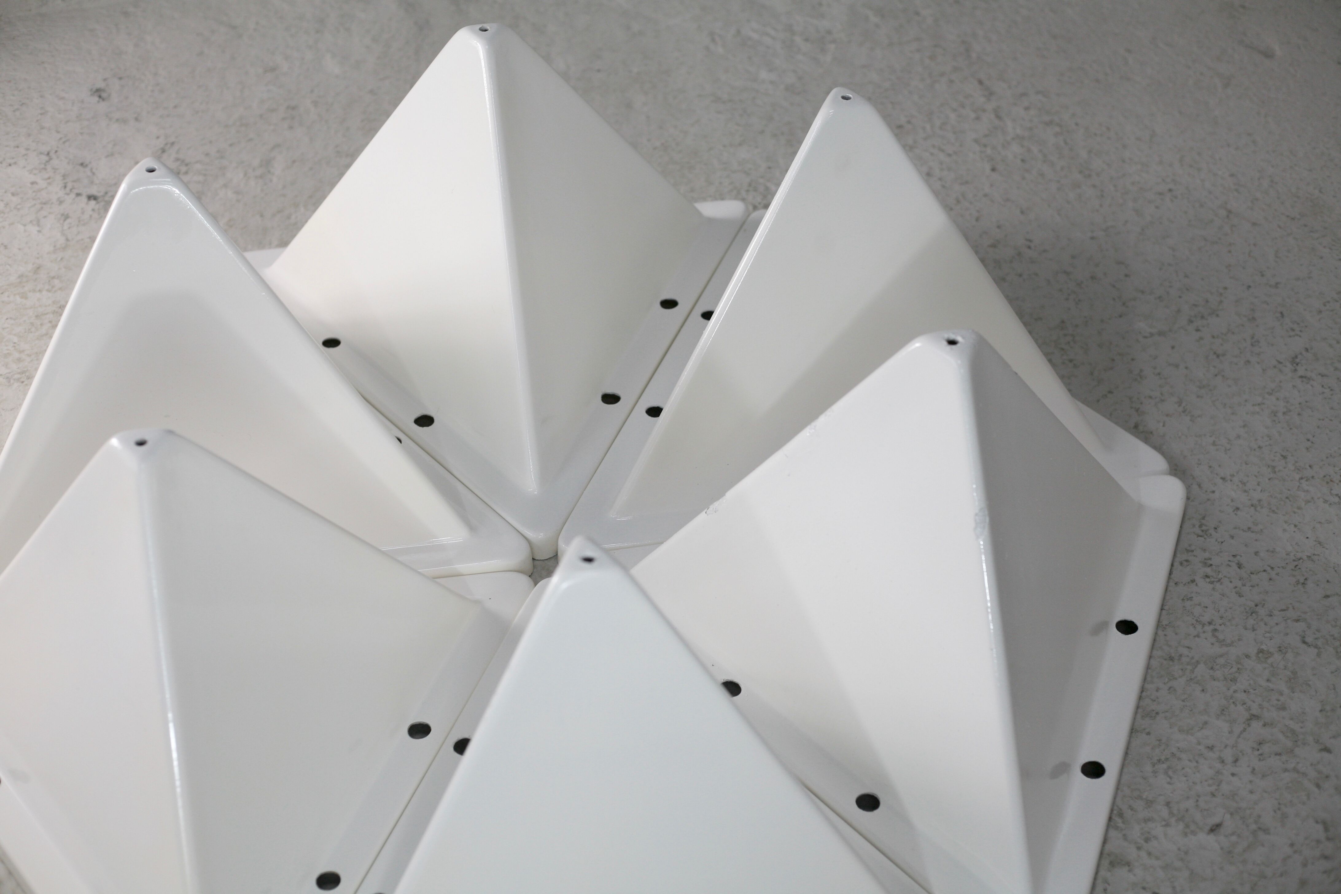 Fiberglass circa 1970. 6 tetrahedron-shaped elements. France.