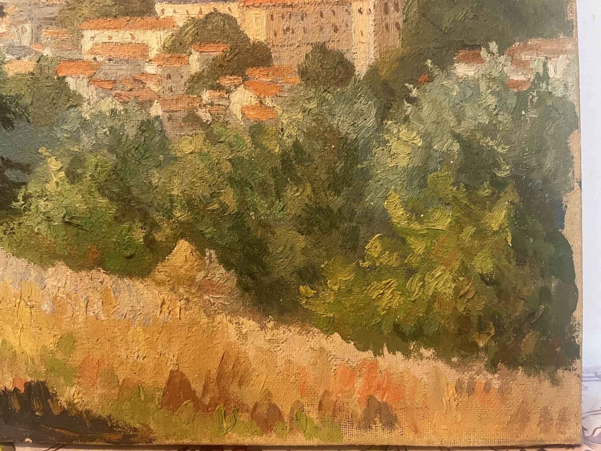 Oil on canvas rural landscape, village steeple and its countryside.