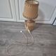 vintage table lamp dame jeanne covered in rattan wicker with a handle