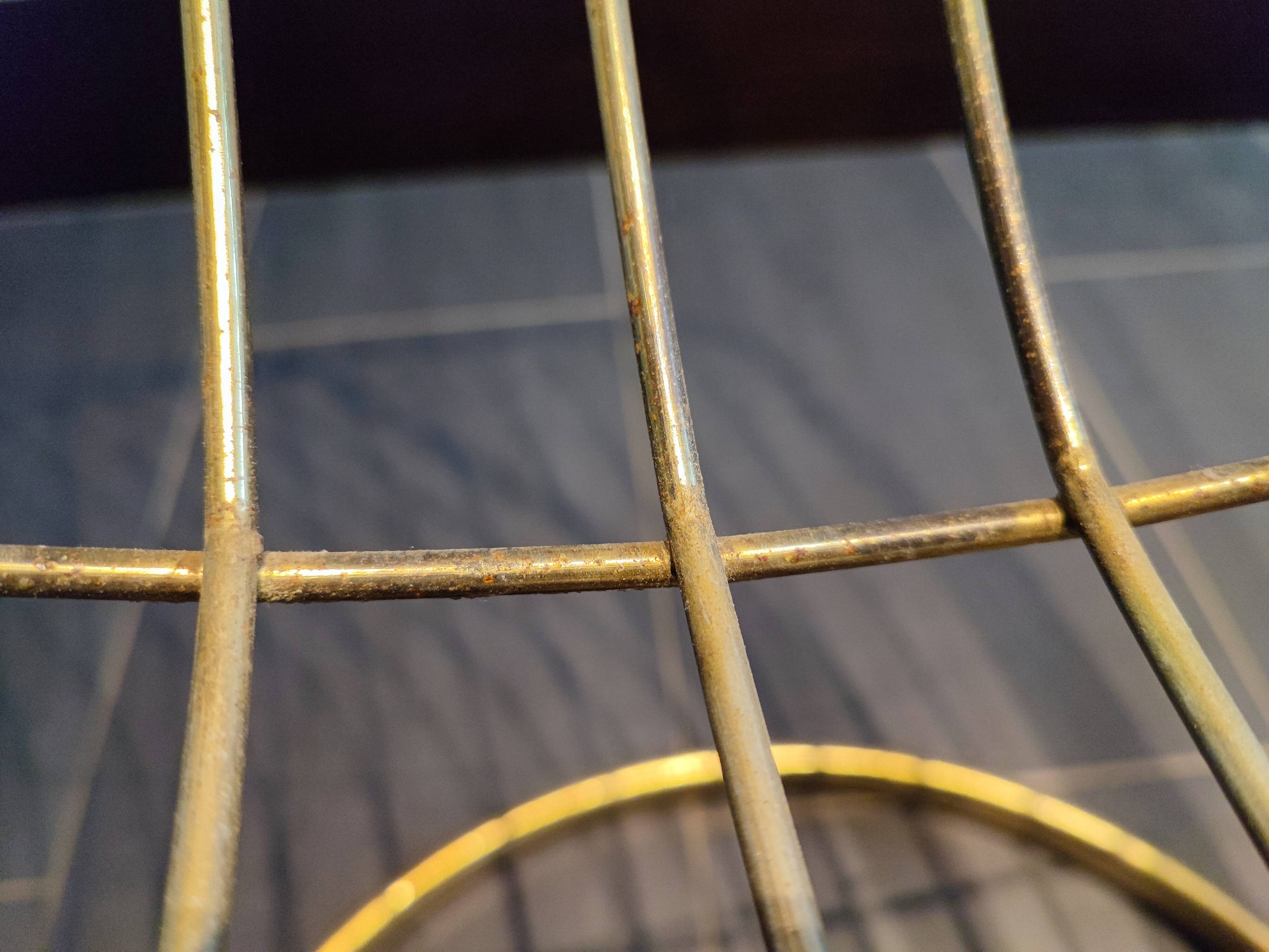 Tubular metal chair covered with gilding