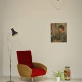 Red and mustard yellow fabric armchair in 1970s style