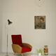 Red and mustard yellow fabric armchair in 1970s style