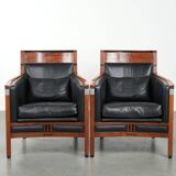 Set of 2 black leather Art Deco design armchairs in good condition