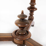 Round dining table of walnut with inlaid wood, 1890s