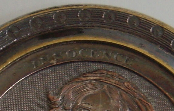 Small engraved metal box innocence