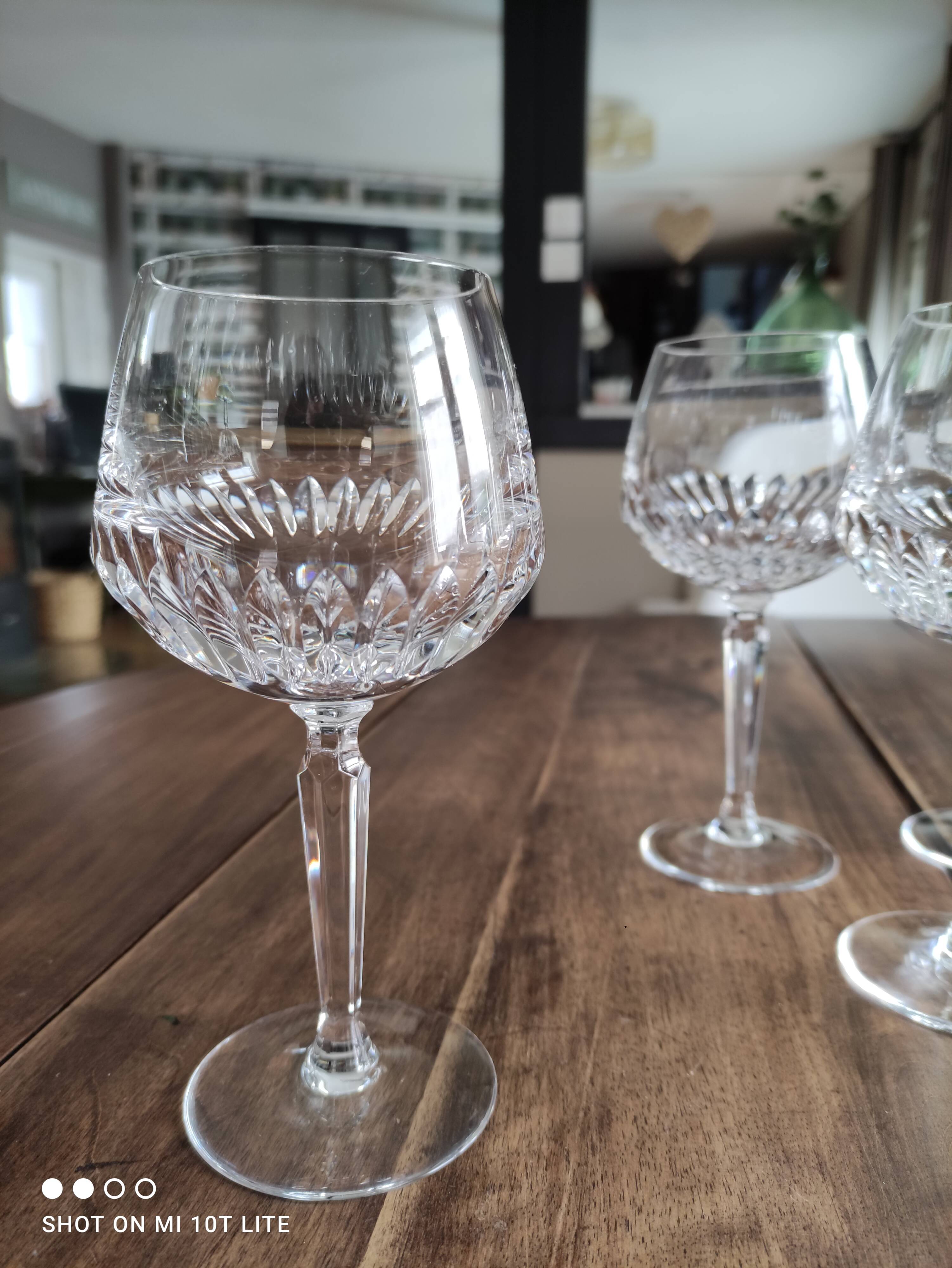 Set of 7 cut crystal wine glasses