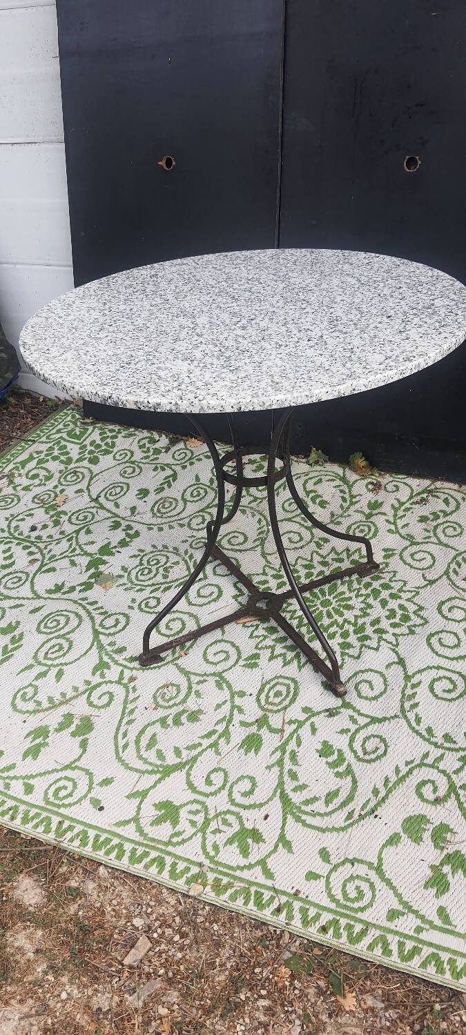 Wrought iron pedestal table