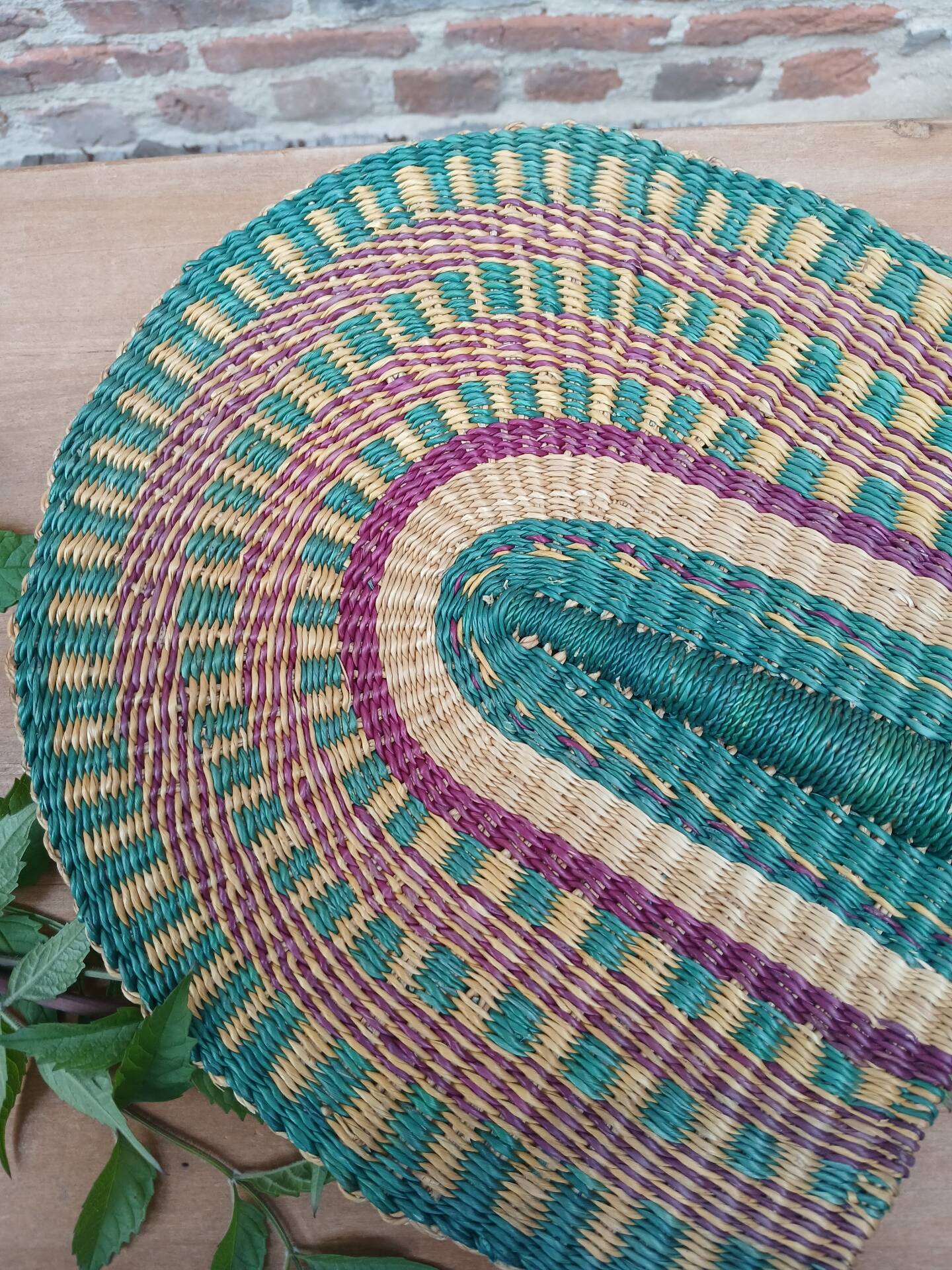 Éventail africain en fibres naturelles