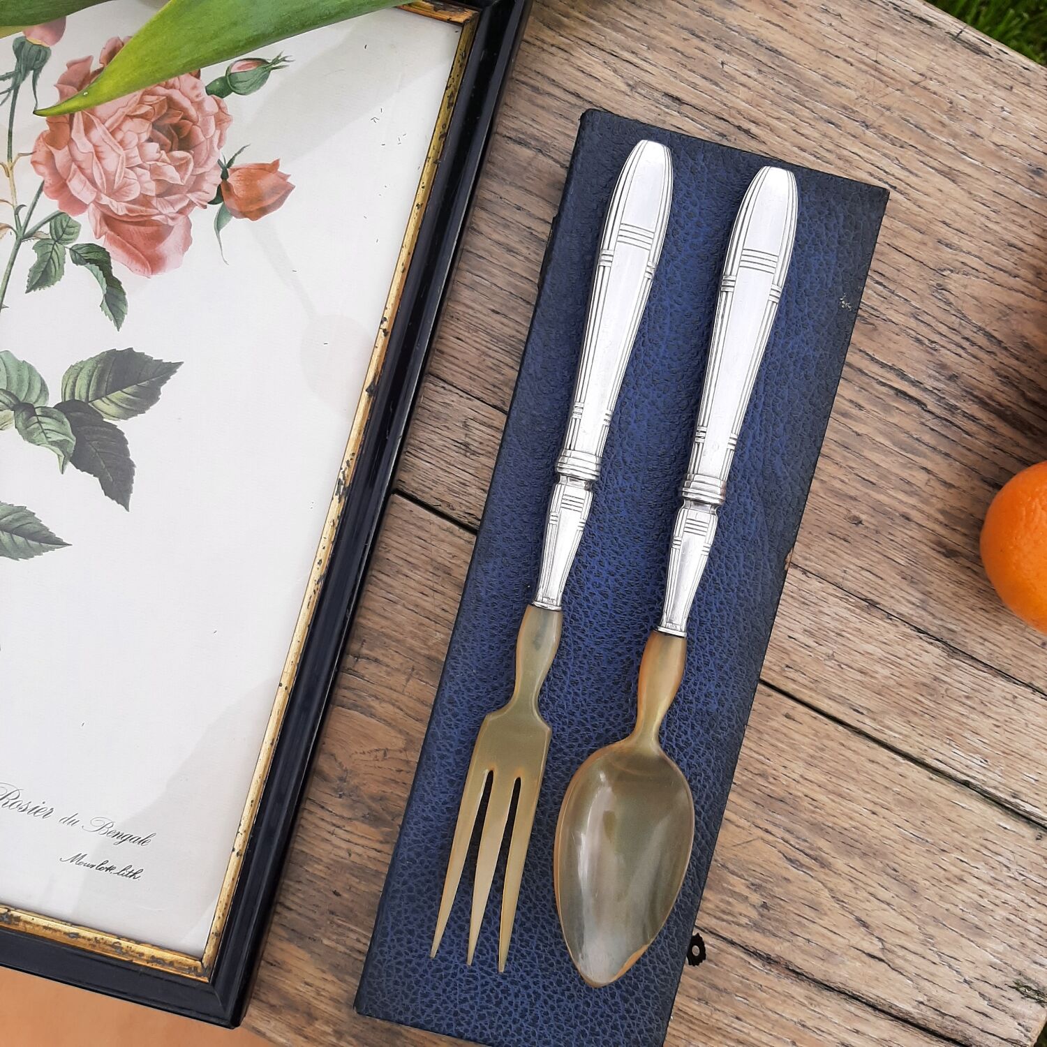 Corn and silver metal salad cutlery