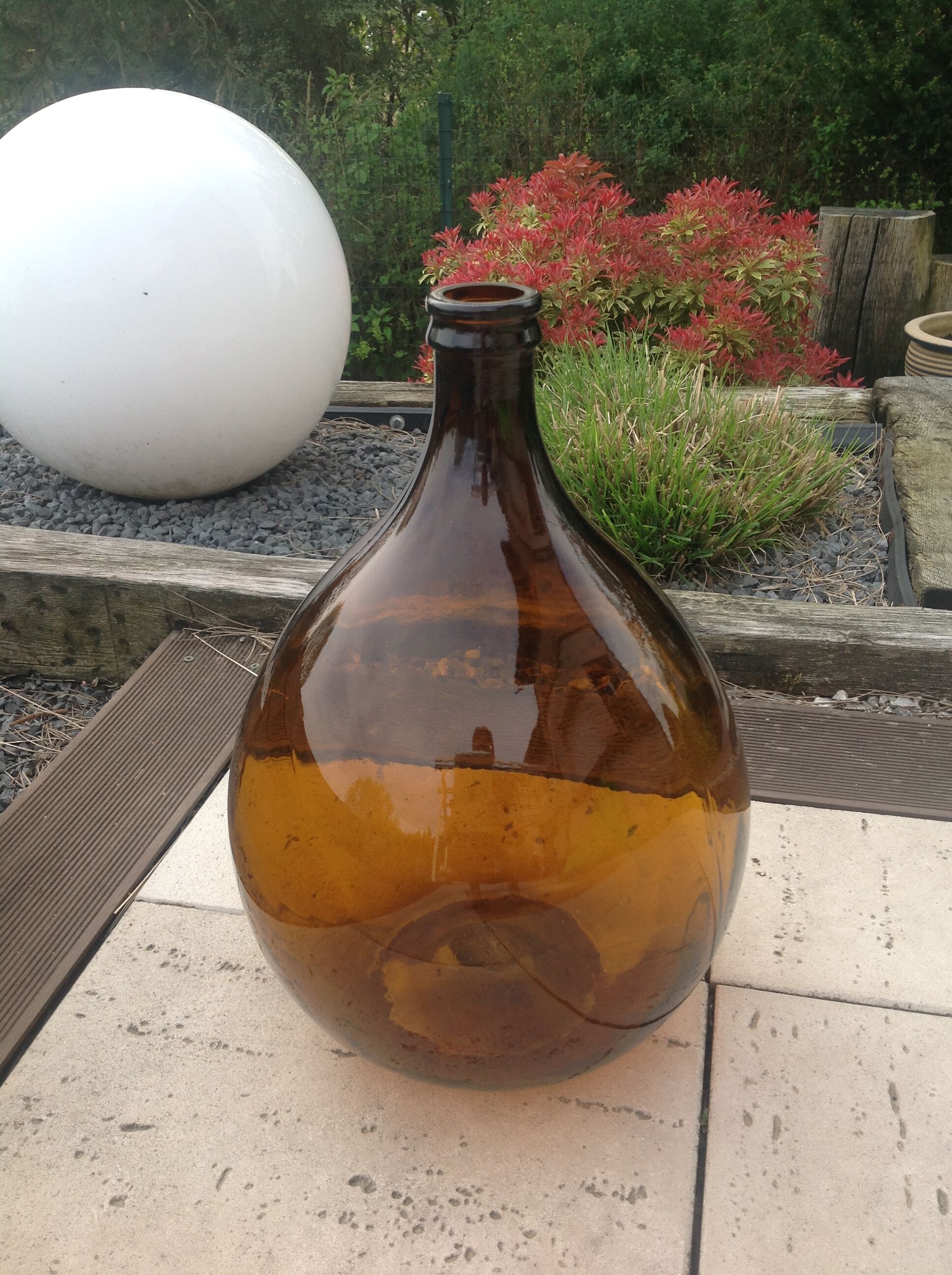 Old demijohn bonbonne smoked glass