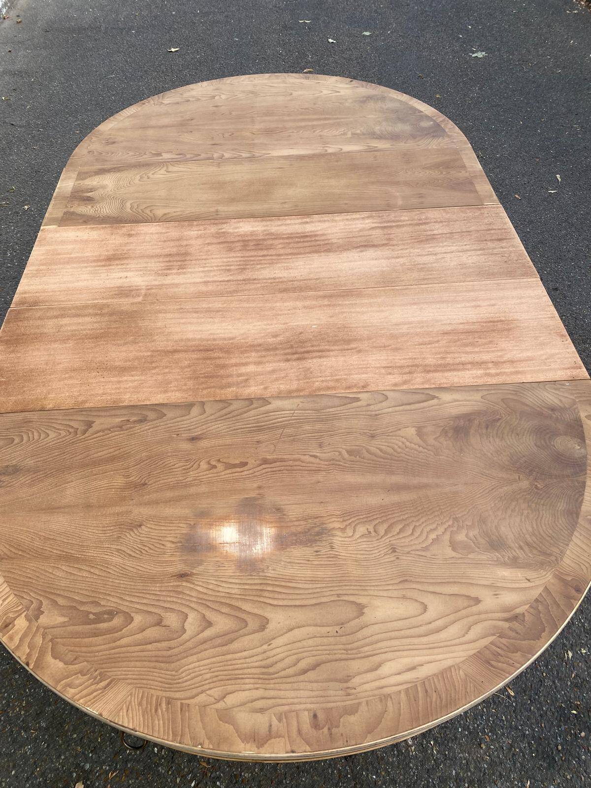 Round extendable dining table Regency central leg stripped mahogany 1960