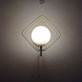 Metal applique with 80s glass sphere