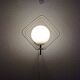 Metal applique with 80s glass sphere