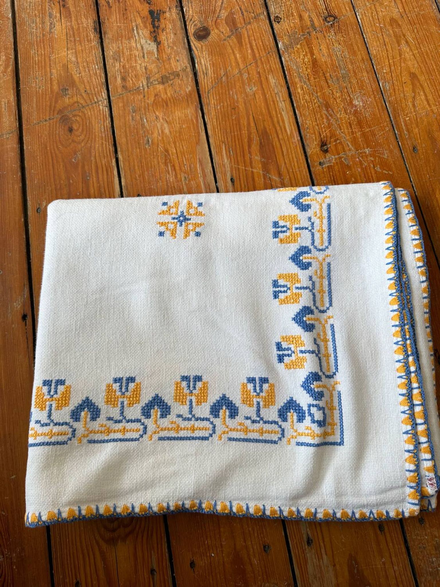 Embroidered white tablecloth