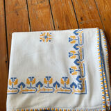 Embroidered white tablecloth