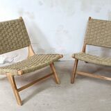 Pair of low armchairs in wood and woven rattan