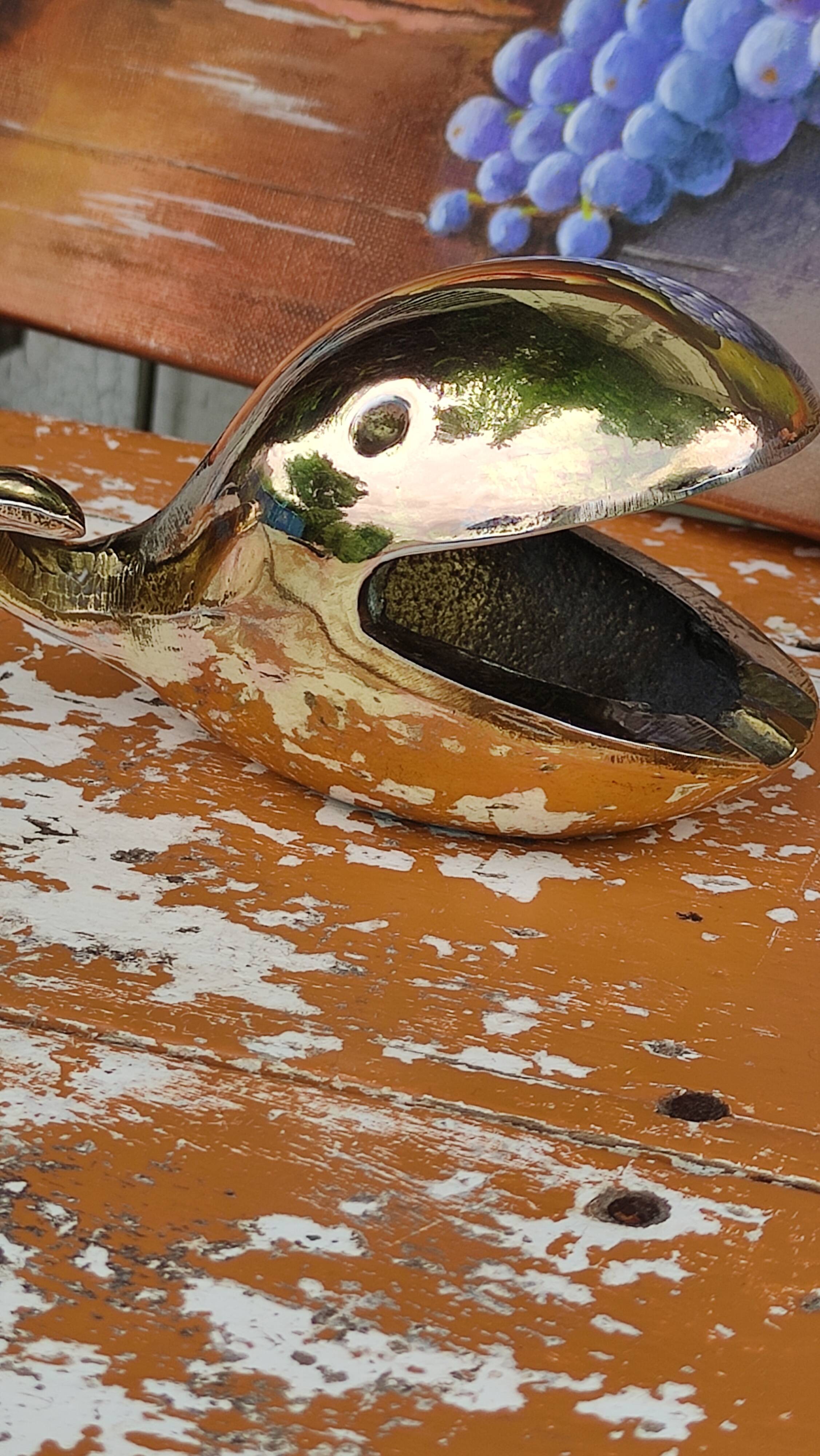Old gilded brass ashtray