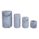 Four white marble candlesticks with black veins, 70s design