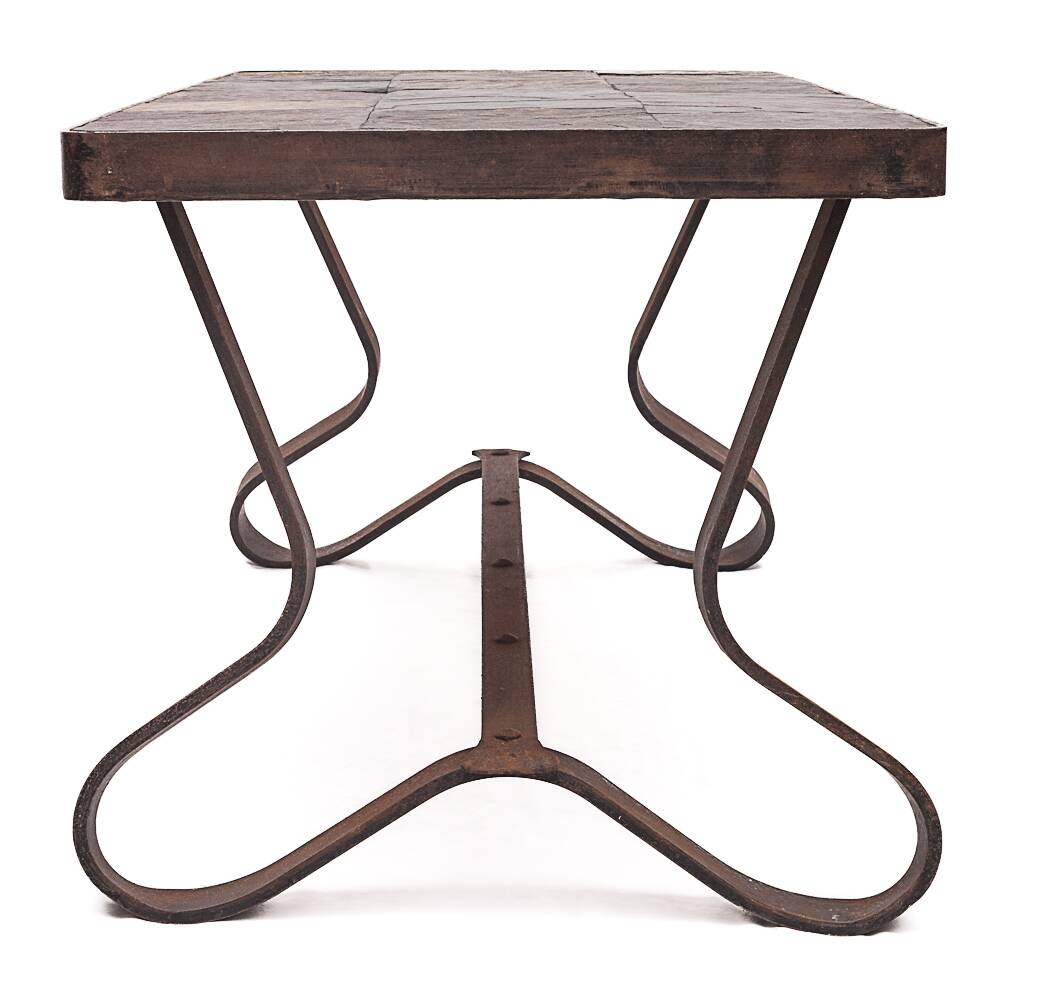 Brutalist coffee table by Adnet