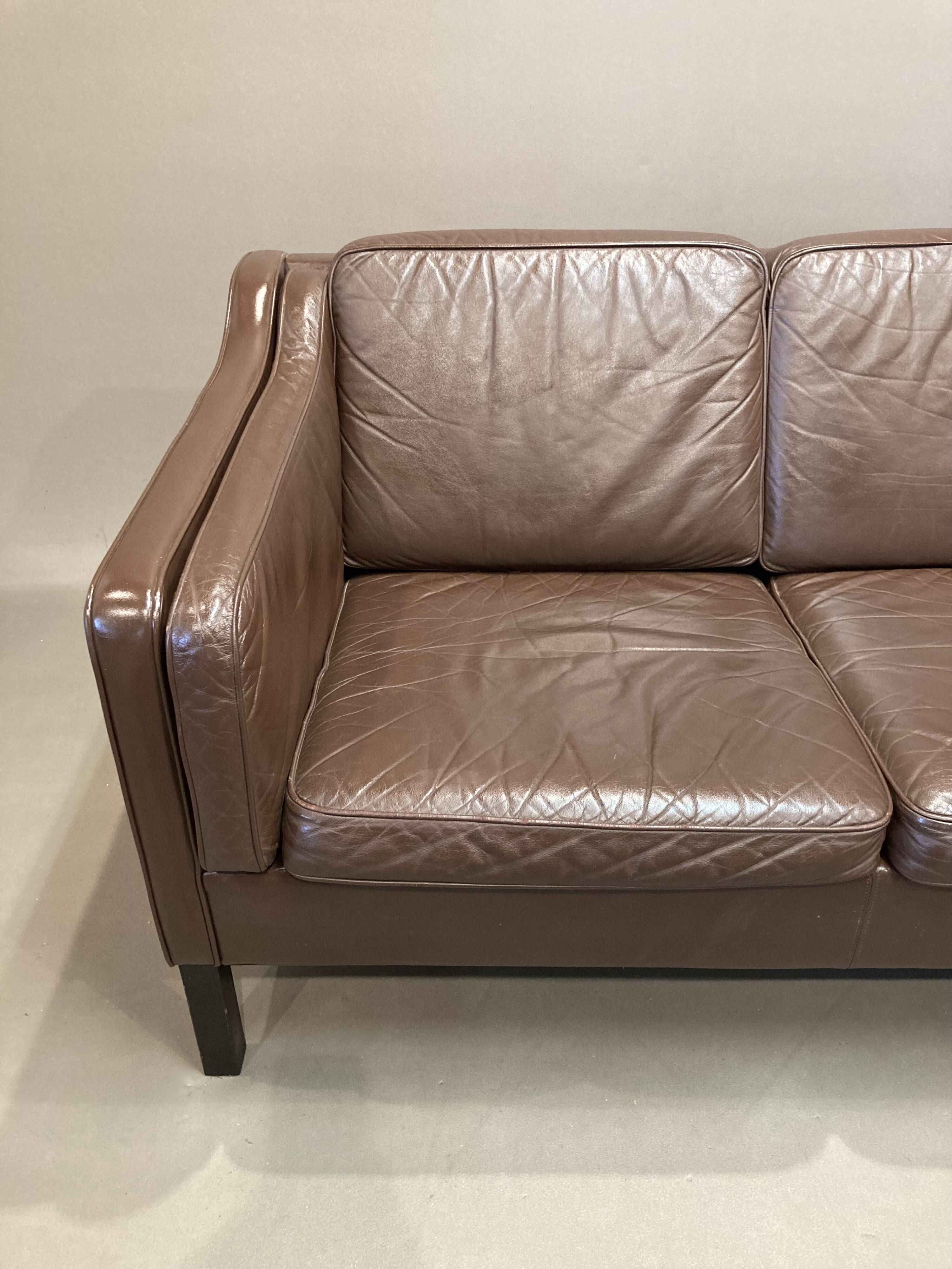 Scandinavian design 3-seater leather sofa.