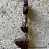 Carved wooden wall candle holder