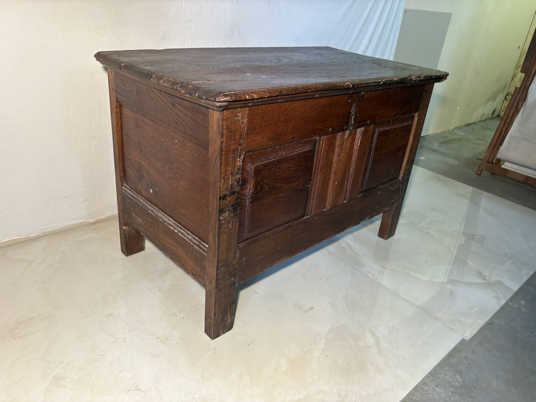 Rustic antique oak chest, original fittings and moulded panels.