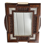 Oriental mirror in carved and turned wood inlaid with mother-of-pearl H 44/L 38 cm
