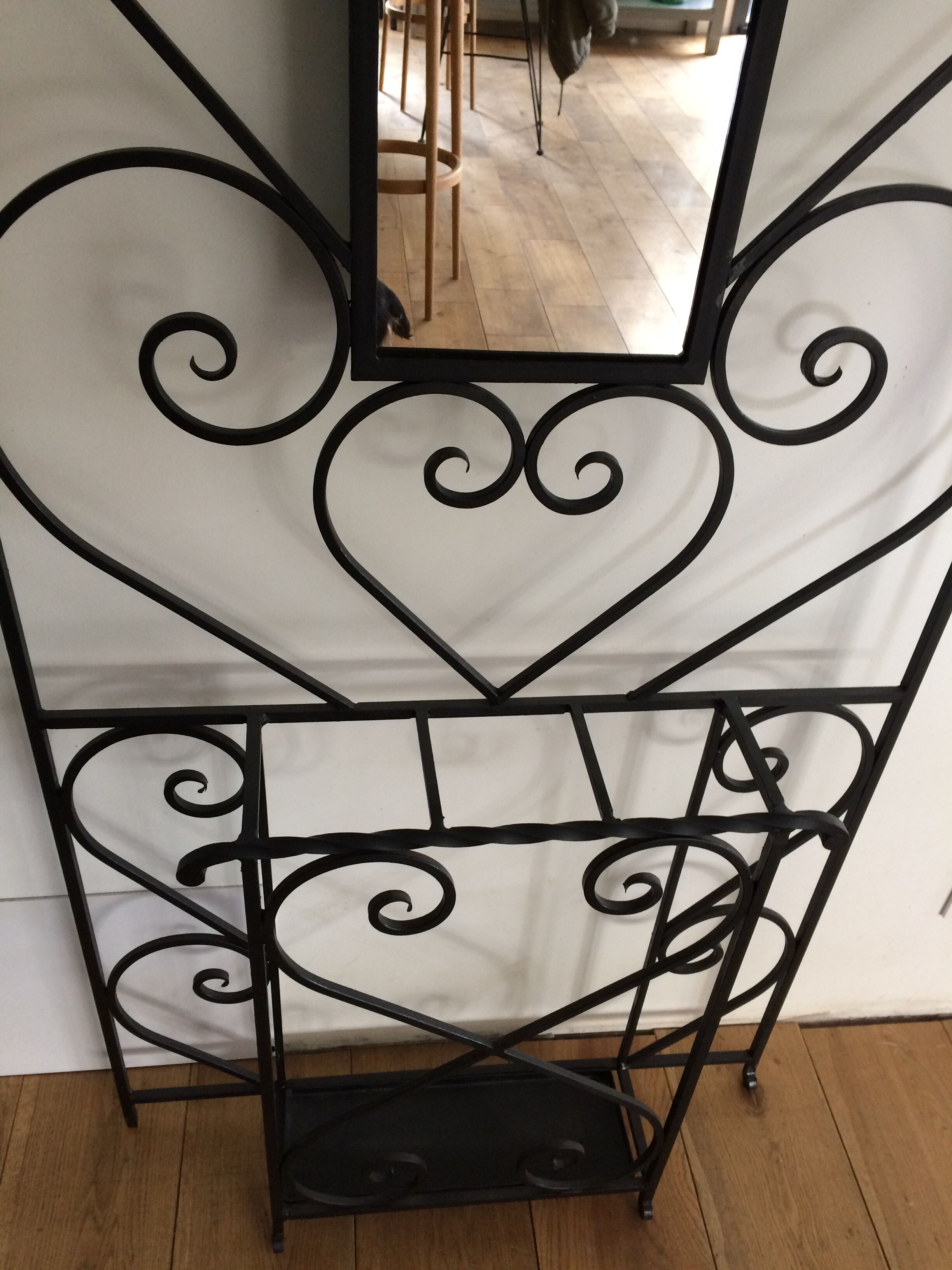 Wrought iron coat holder
