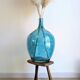 Antique tripod stool in patinated solid wood