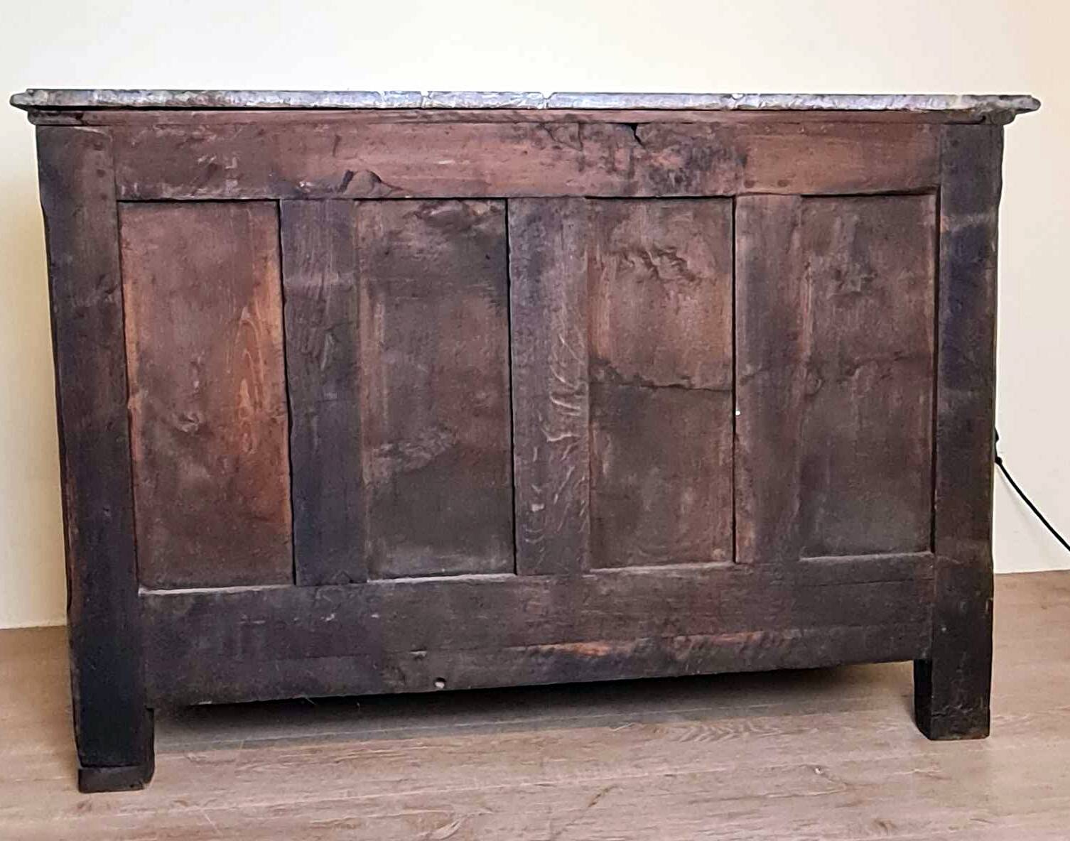 Louis XIV period Arbalette chest of drawers in solid walnut circa 1700