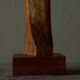 Sculpture of a woman and child in hand-carved wood, mid-20th century.